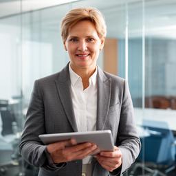 Confident finance director in a glass meeting room reviewing a report on a tablet